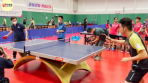 李家超參觀香港體育學院，與乒乓球港隊一哥對打秀球技