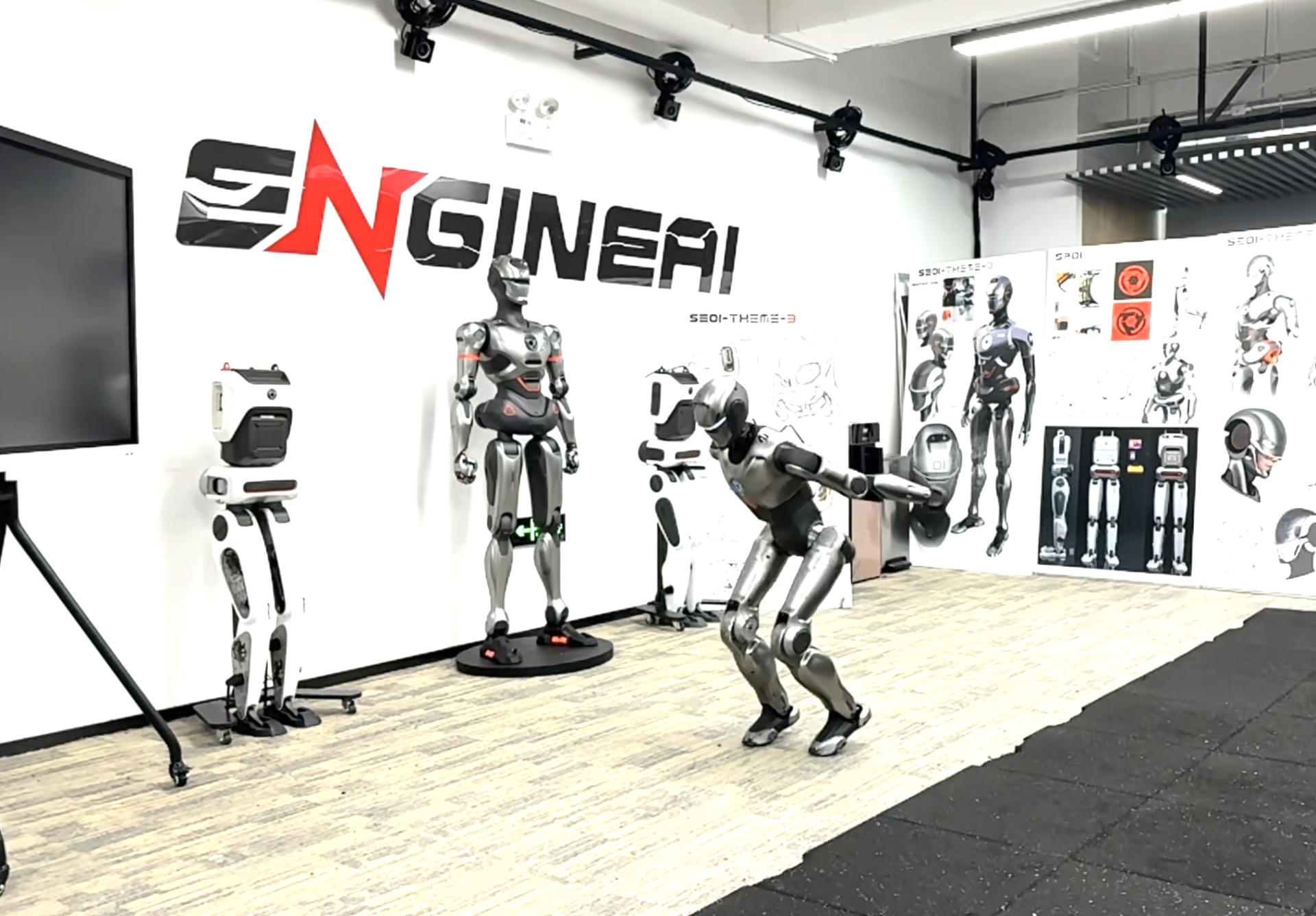 The humanoid robot is performing a forward flip.