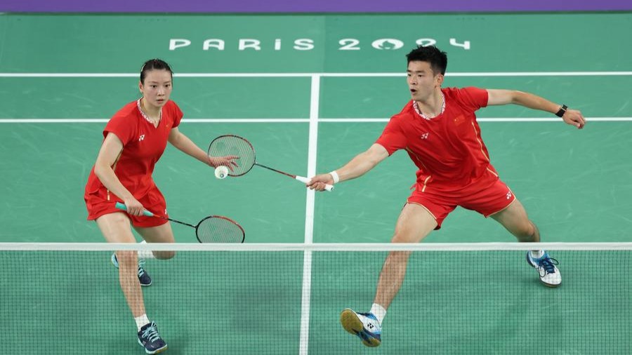 Day 7: Chinese shuttlers dominate mixed doubles, hosts' Marchand bags 4th swimming gold