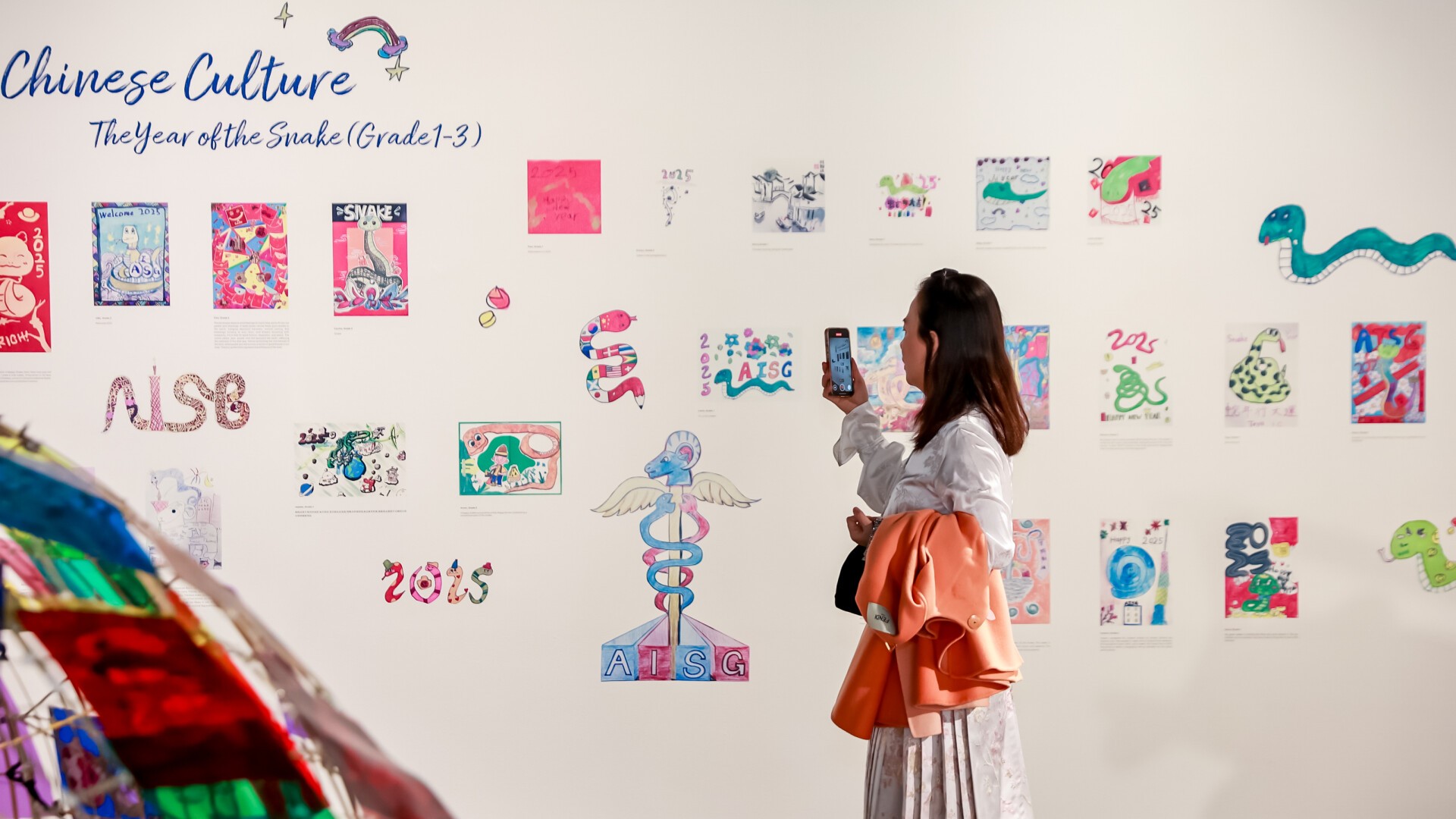 Exhibition re-imagines Year of Snake with children and international perspectives