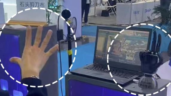 Robot vs. human in "rock, paper, scissors"