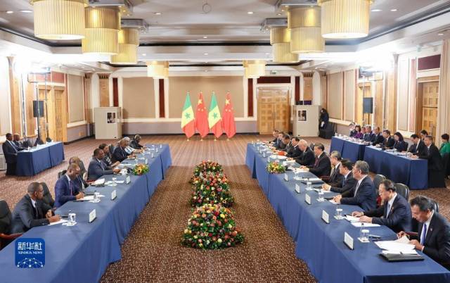 当地时间8月23日下午，国家主席习近平在约翰内斯堡出席金砖国家领导人会晤期间会见塞内加尔总统萨勒。新华社记者 丁海涛 摄