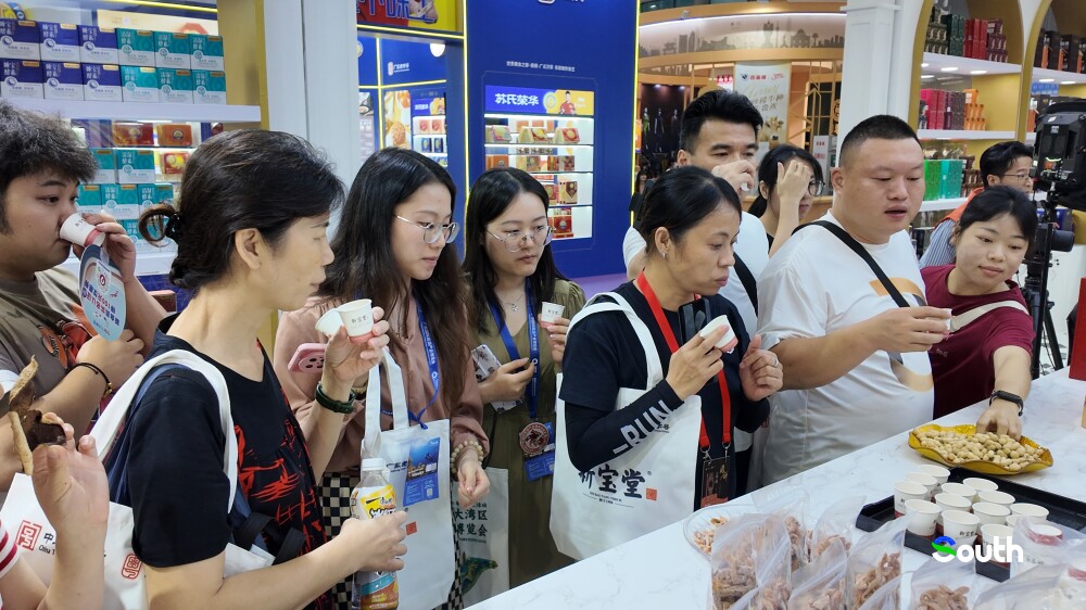 Visitors flocked to taste classic Chinese snacks.