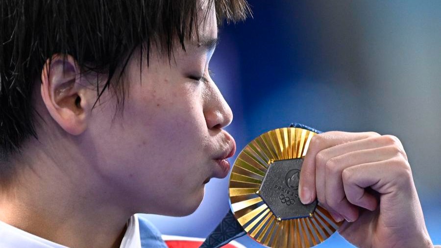 Day 11: Sensational Quan retains diving title, multiple new records created