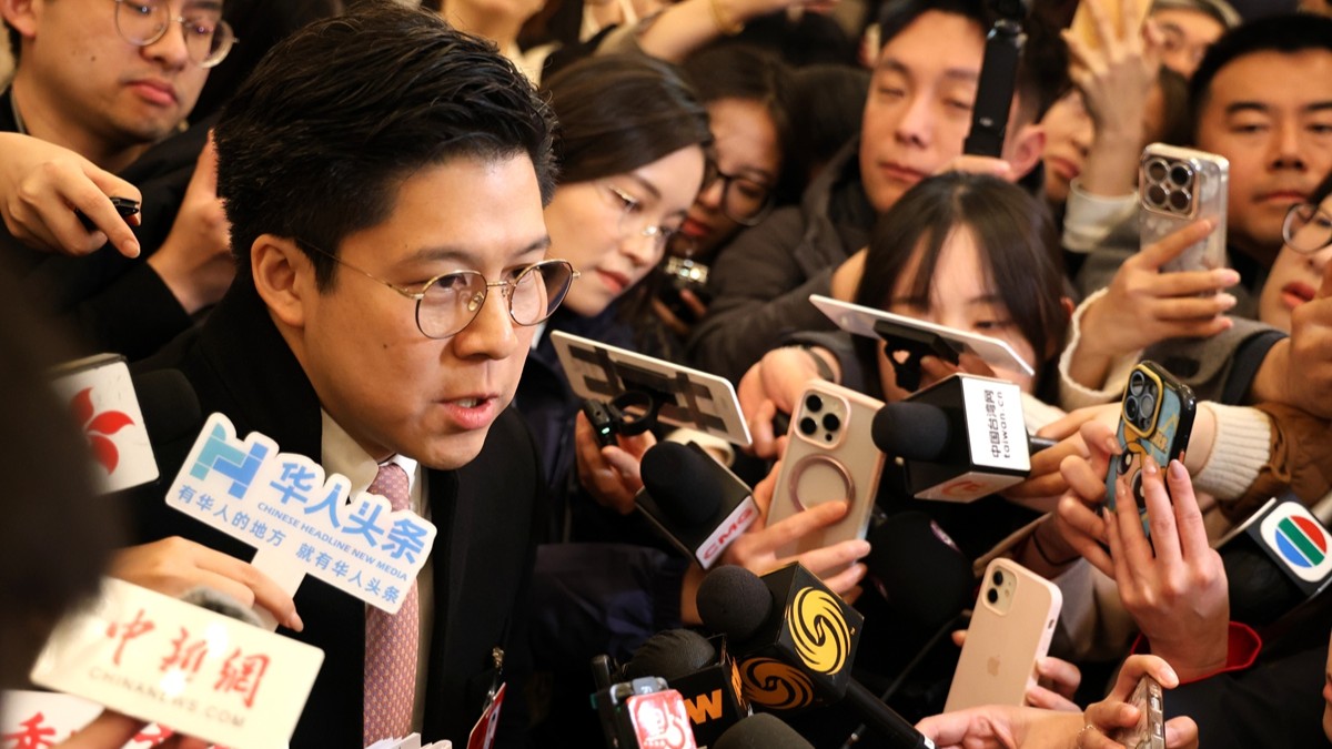 'Deeply touched' by government work report, says HK NPC deputy Fok Kai-kong