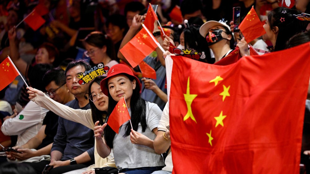 舞动“中国红” 激荡“亚运情”——爱国热情在赛场内外涌动