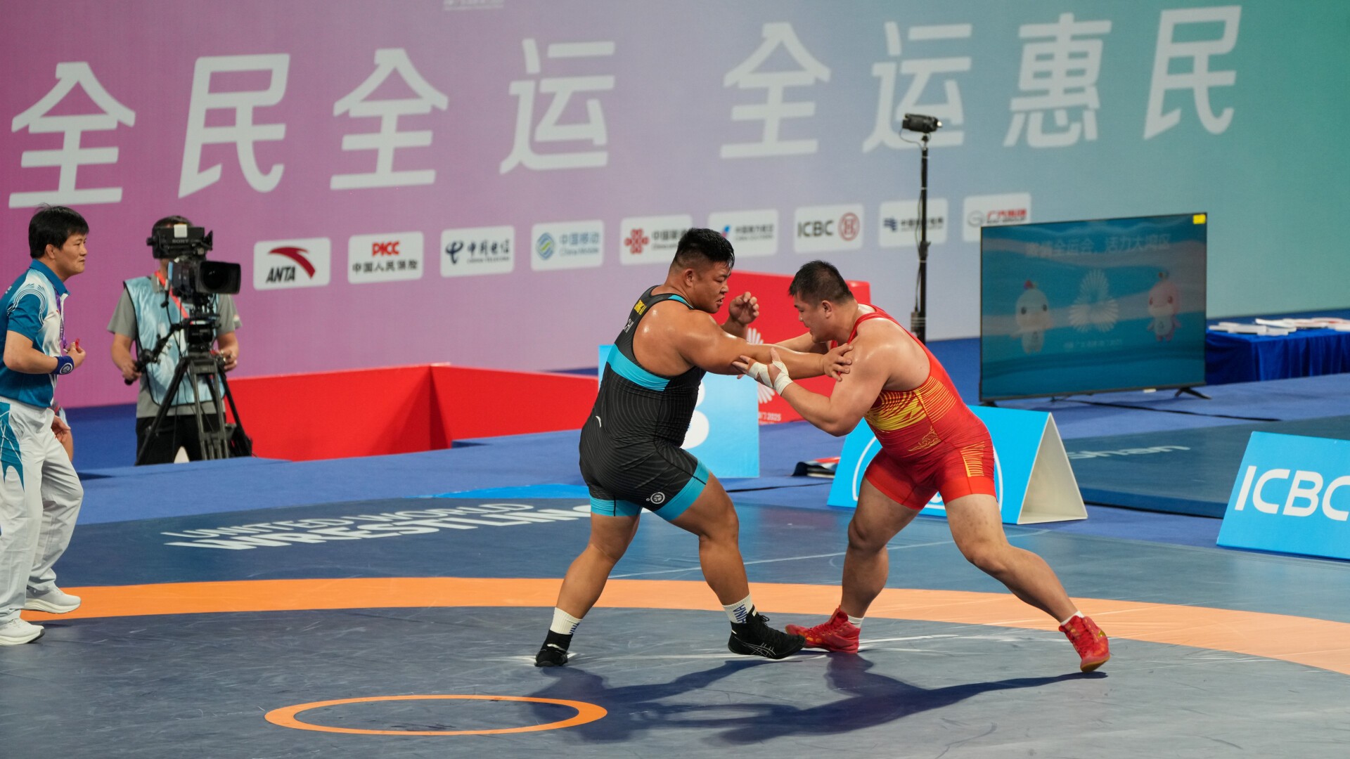 InPics | Wrestling thrills in Qingyuan at 15th National Games
