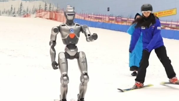 Chinese-developed humanoid robot skis in Guangzhou, China