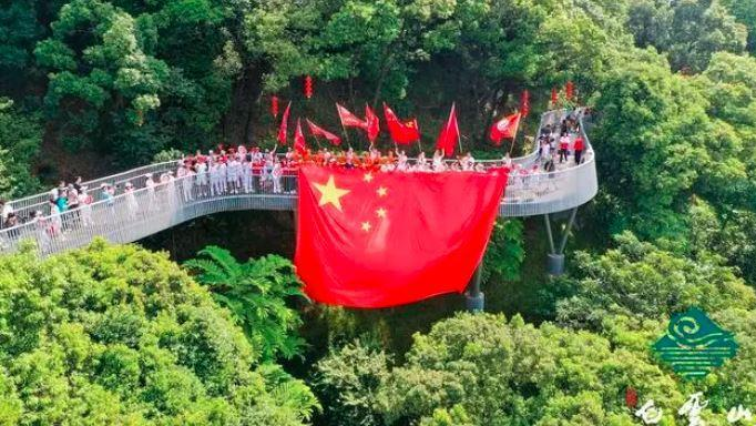 Giant five-star red flags fly across China for National Day