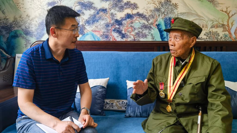 “党的阳光雨露浇灌了胜利之花！”——对话百岁抗战老兵崔良奎