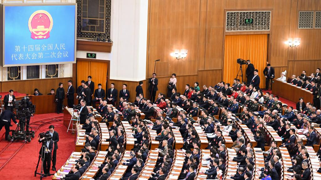 China Focus: Chief drafter expounds on gov't work report