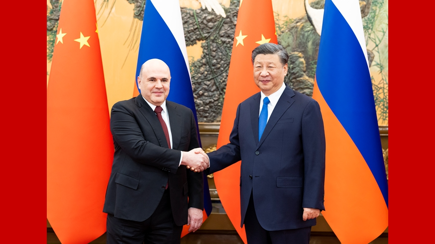 Xi meets Russian PM