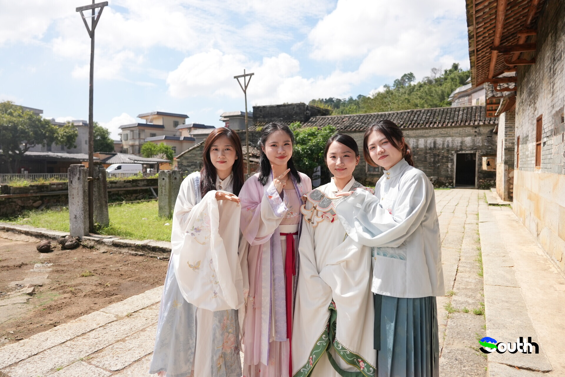Traditional architecture in old villages attracts visitors to dress in Hanfu for vintage-style social media post.