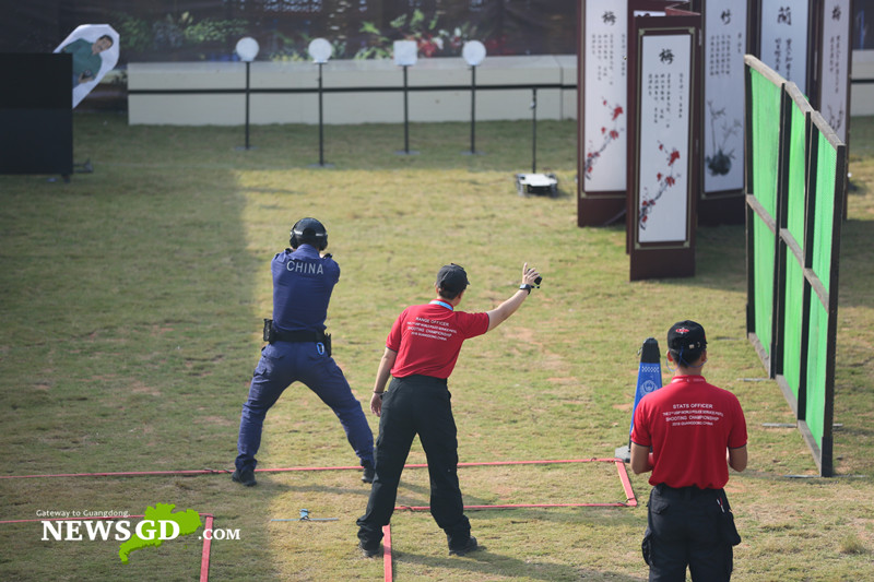 Player from China Team 2 shooting in the simulated Important Person Protection. (Photo: Steven Yuen)