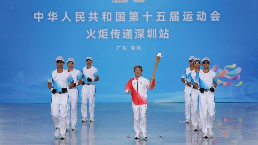 InPics|First-ever cross-boundary torch relay held for China's National Games