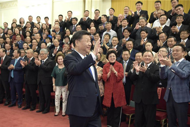 Xi meets representatives of overseas Chinese