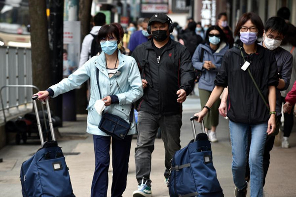 Hong Kong reports triple-digit COVID-19 spike for 3 consecutive days