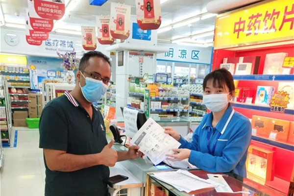 Guangzhou launches mask ordering service for foreign experts
