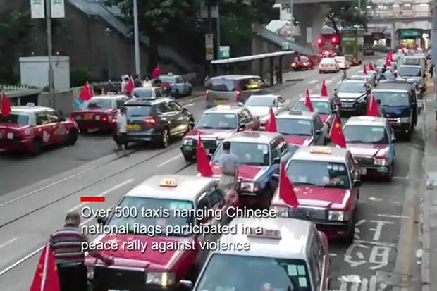 Taxis rally in Hong Kong calls for peace, restoring order