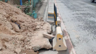 广州一女子踩空施工路面排水井致骨折 应该谁来负责？