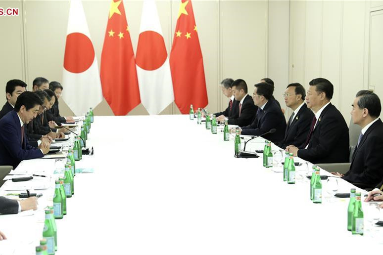 Xi, Abe meet on ties, reaffirm readiness to strengthen China-Japan partnership