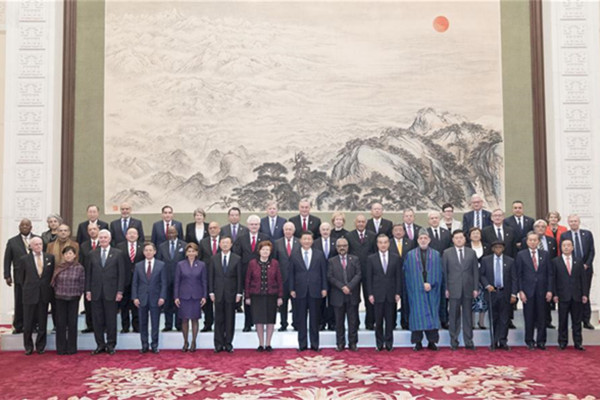 Xi reiterates China's adherence to multilateralism, opening-up