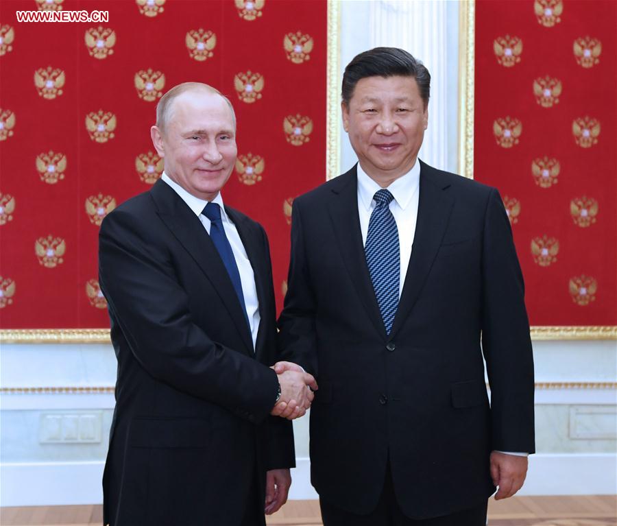 Xi, Putin agree to boost coordination on major issues