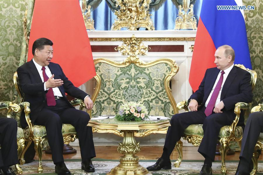 China, Russia pledge to play role of ballast stone for world peace