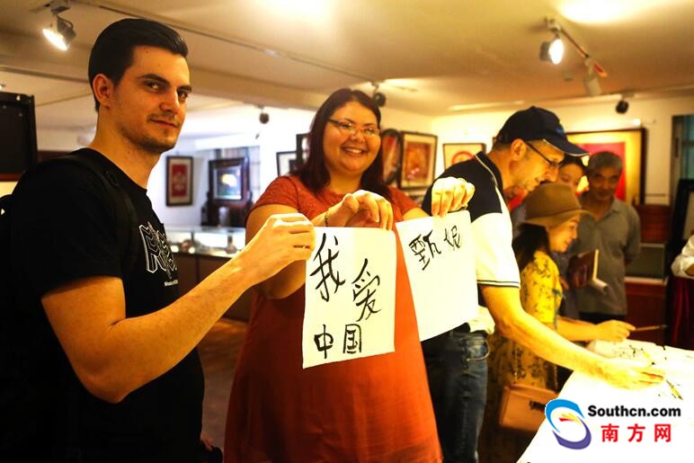 Expats learn intangible cultural heritages at intl tourism expo