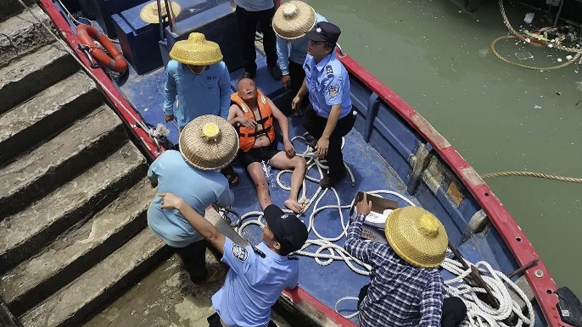 Father and son survive 26-hours adrift after being swept out to sea by typhoon
