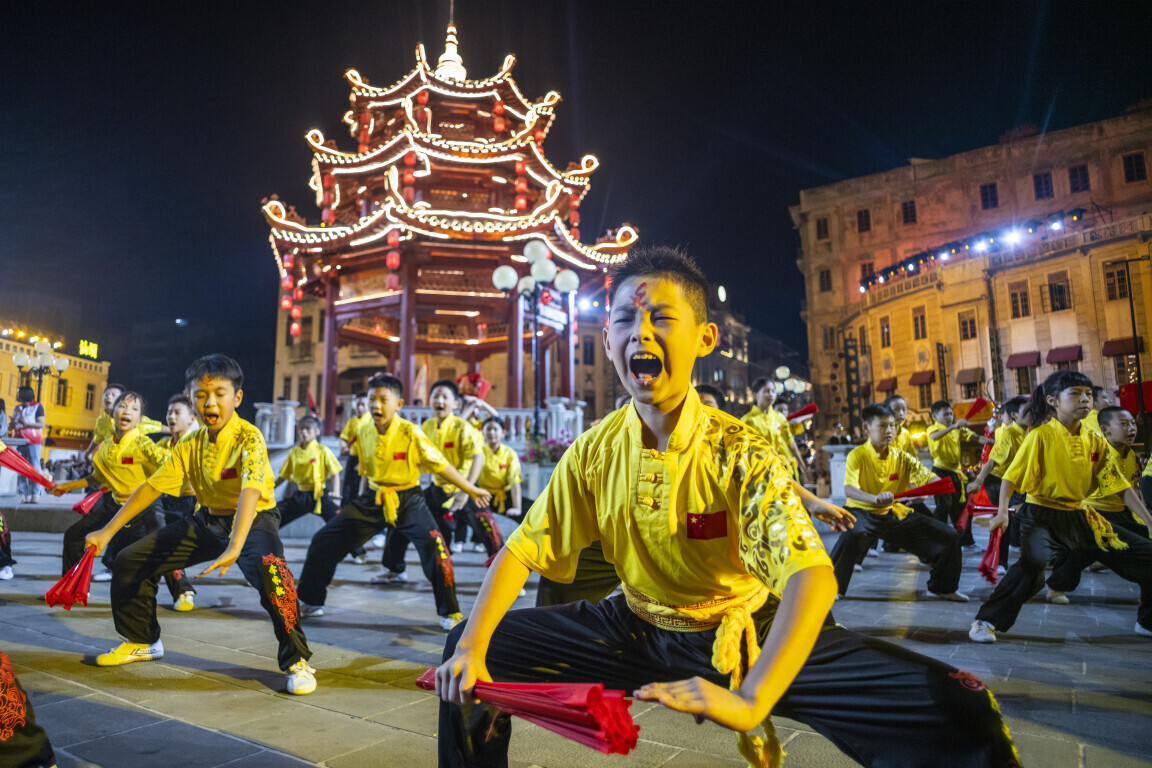 Little performers at a cultural celebration in Small Park historical area, Shantou, Guangdong