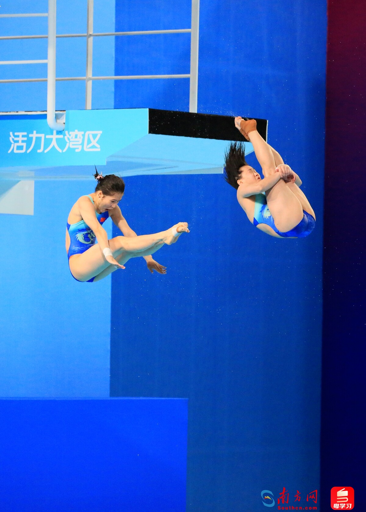 全红婵和王伟莹在比赛中。图：南方网、粤学习记者 刘竞宇