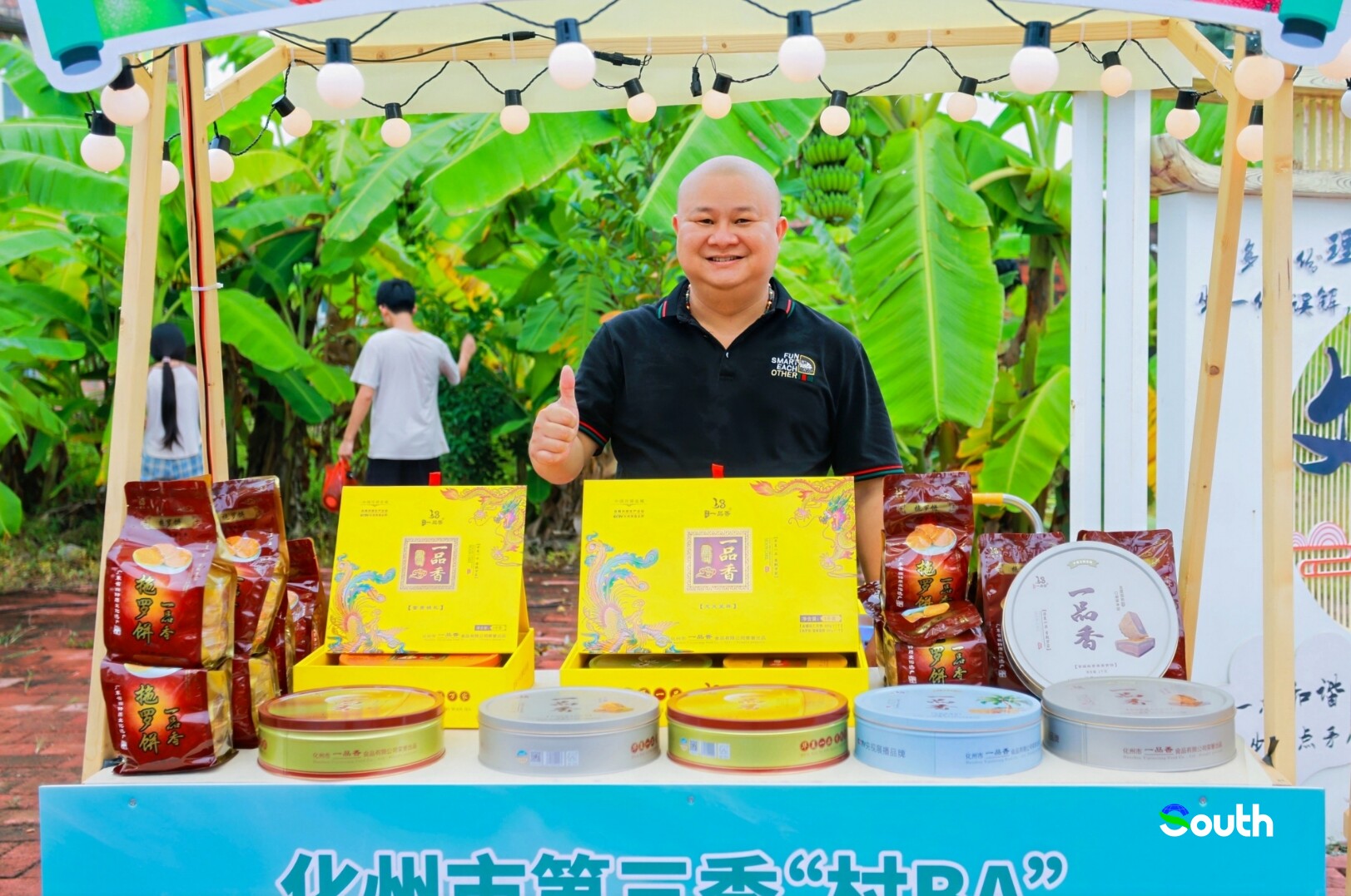 Vendor proudly displays local specialties.