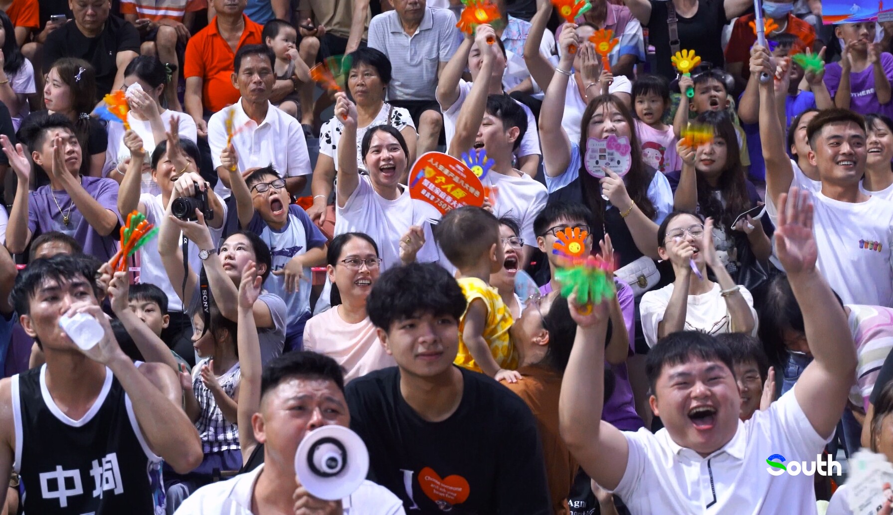 Spectators cheer enthusiastically during the tournament.
