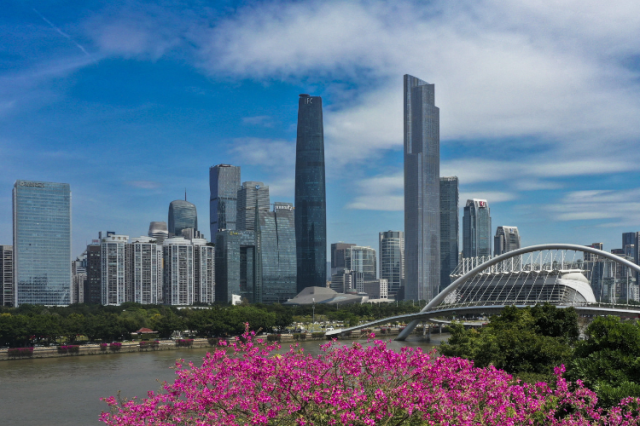 How does Guangdong promote high-quality development?