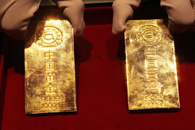 投资金条。新华社发