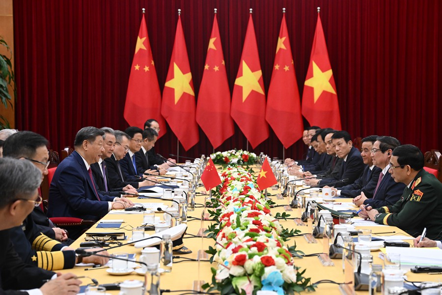4月14日晚，国家主席习近平在越共中央驻地会见越南总理范明政。新华社记者 谢环驰 摄