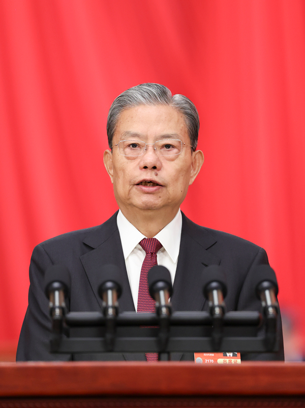 　　3月8日，十四届全国人大三次会议在北京人民大会堂举行第二次全体会议。受全国人大常委会委托，赵乐际委员长向大会报告全国人大常委会工作。新华社记者 丁海涛 摄