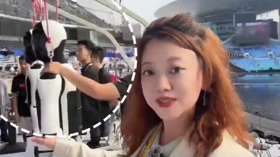 Robots strike first musical note at China's National Games opening