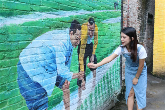 Artistic graffiti get on walls in Guicheng