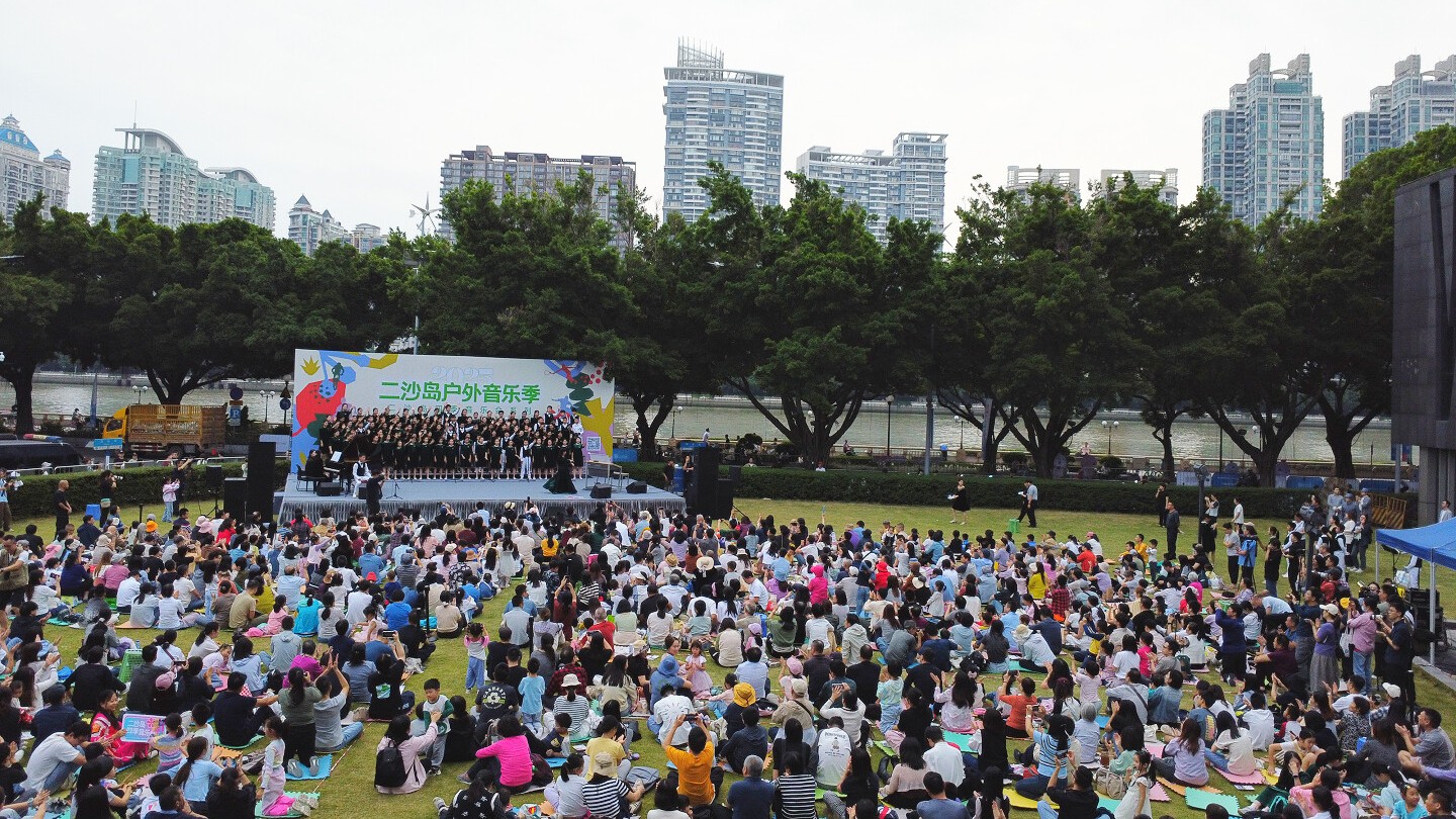 二沙岛户外音乐季火热上演！全运会会歌唱响珠江畔