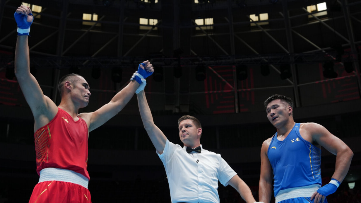 广东拳击历史性突破！巴依克吾孜勇夺拳击大级别项目金牌