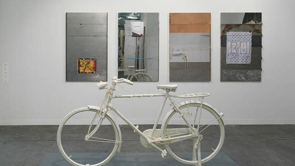 Bone carved bicycle from Guangdong Intangible Cultural Heritage Exhibition Center gains international attention