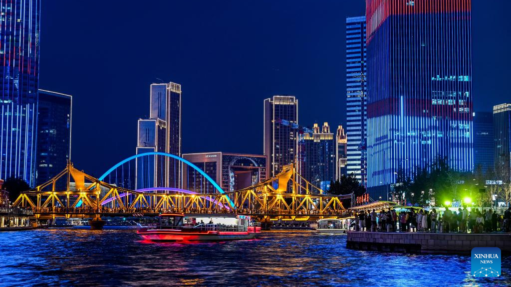 Night view by Haihe River in N China's Tianjin