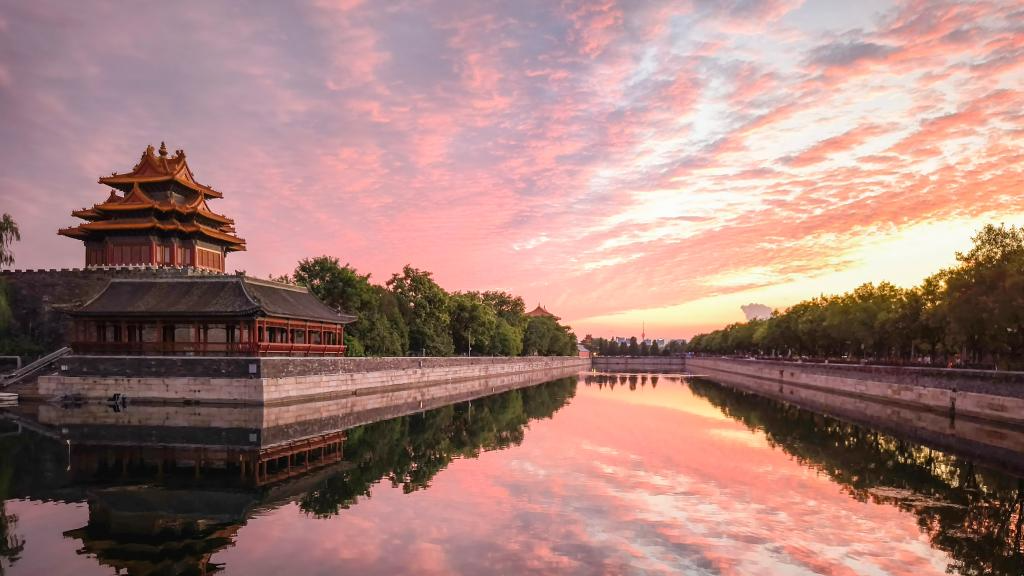 Turret of Palace Museum bathed in evening glow in Beijing