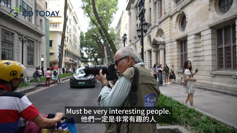 Pulitzer photojournalist's wander around Guangzhou: "There are hundreds of photos to take"