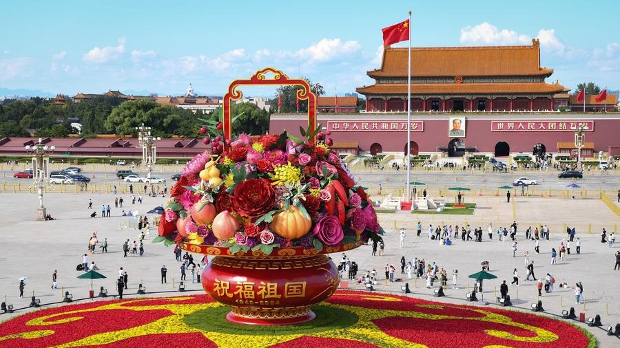 Experts, officials applaud Xi's pledge to promote peace and development in National Day speech