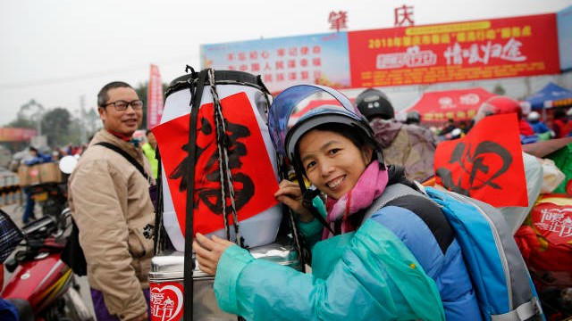 “摩托返乡”背后的“粤式暖流”