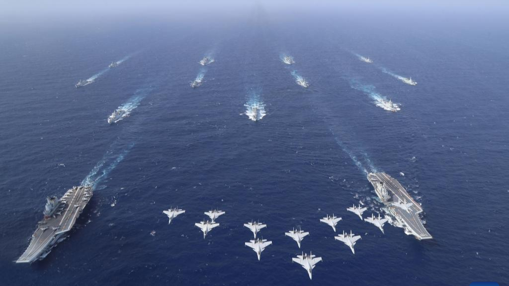 Chinese navy conducts dual aircraft carrier formation exercise for first time