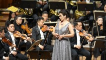 What is it like to witness a symphony performed by Guangzhou Symphony Orchestra at Xinghai Concert Hall?